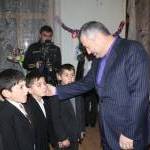 В преддверии Нового 2011 года Эдуард Кокойты посетил районы Республики и поздравил детей с наступающим праздником